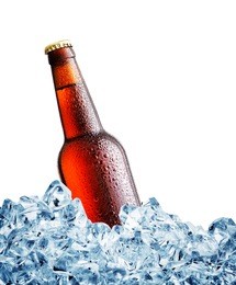 brown misted over bottle of the beer on ice isolated on white background