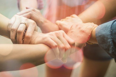double exposure of hands were a collaboration concept of teamwork and bokeh background