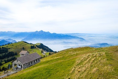 view from mt. rigi. the rigi (or mount rigi; also known as queen of the mountains) is a mountain massif of the alps, located in central switzerland. on 24 october 2016