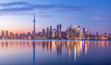 toronto skyline with purple light - toronto, ontario, canada