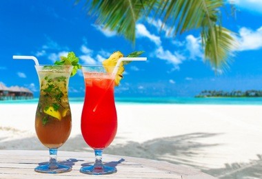 cocktail with blur beach on background