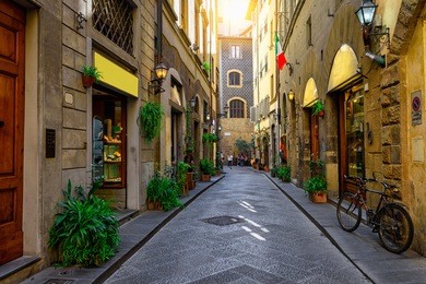 narrow cozy street in florence, tuscany, italy. architecture and landmark of florence, florence cityscape