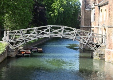 the "mathematical bridge" over the river cam at cambridge. this famous wooden bridge at queens college was originally designed and built in 1749 but has been rebuilt twice since.