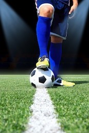 kicking the soccer ball