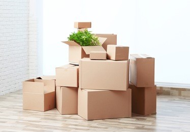 house moving concept. boxes in empty room