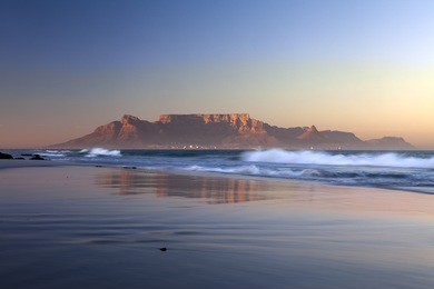 view of table mountain from bloubergstrand in  cape town south africa