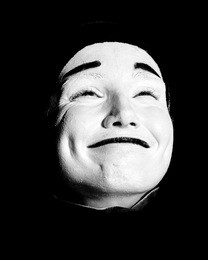 street mime. isolated on black.