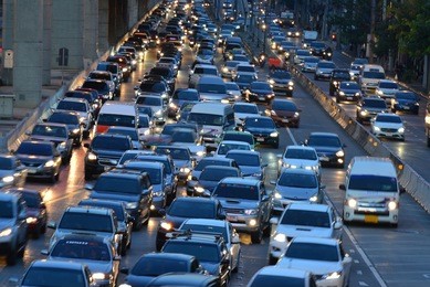 aerial blurred image of traffic along in bangkok,thailand. high-occupancy vehicle lane used at peak travel times. urban infrastructure problem.

