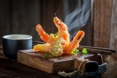 delicious shrimp in tempura with sweet and sour sauce
