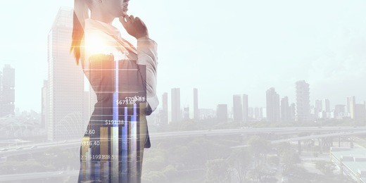 exposure of businesswoman and modern city . mixed media