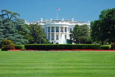 the white house in washington dc with beautiful blue sky in background
