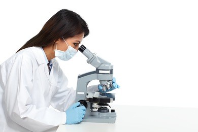chinese scientist woman with microscope.