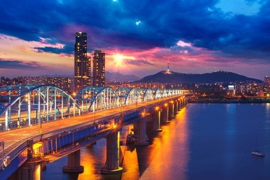 seoul city skyline at dongjak bridge han river in seoul , south korea.