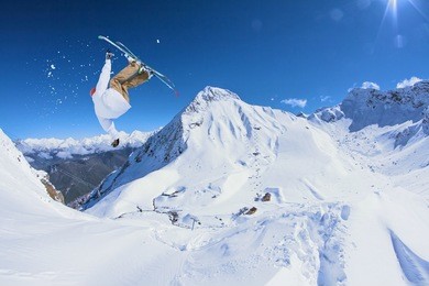 ski rider jumping on mountains. extreme freeride sport.