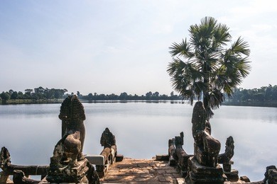 srah srang with lion and naga statues in angkor, cambodia