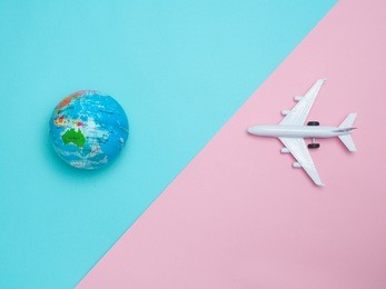 travel around the world for your colorful life .enjoy the funny trip journey .top view for copy space some idea your create destination .object  cute  ,world  vintage on color background