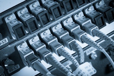 server with fiber optic  cables in data center