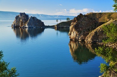 cape burhan and shaman rock on olkhon island at baikal lake, russia