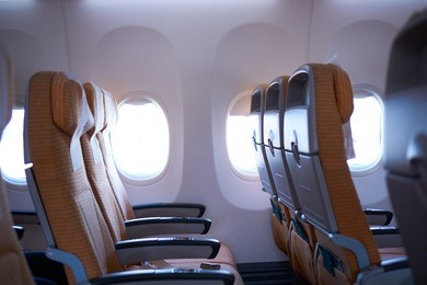 empty airplane seats in the cabin