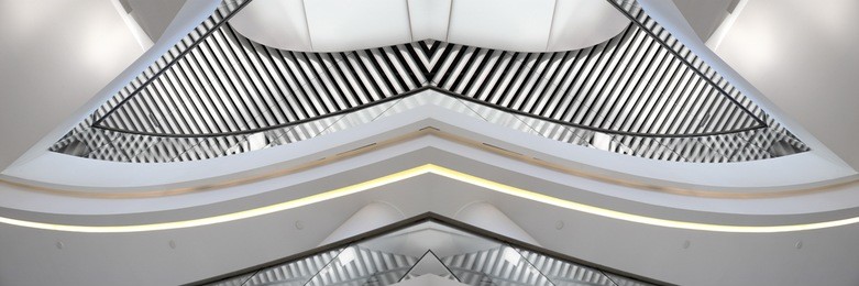 digitally composed photo of interior in hi-tech style with louvered structure. realistic though fictional modern architecture fragment featuring lath ceiling and balustrade.