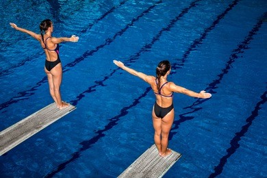 two female divers on training or on competition. 