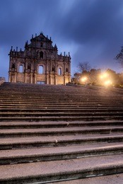 macao landmark - ruins of st. paul's with stairs and lamp in night.