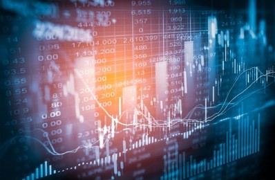 stock market trading graph and candlestick chart for business concept about financial investment.