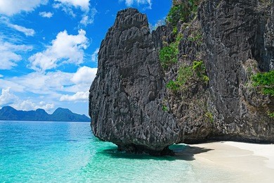 beautiful tropical beach. scenic landscape with sandy beach sea and mountain island, el nido, palawan, philippines, southeast asia. sea bay scenery. popular landmark tourist destination of philippines