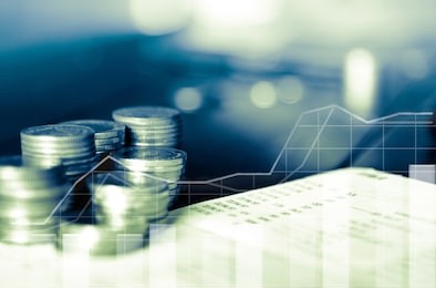 double exposure of rows of coins and account book in finance and banking concept