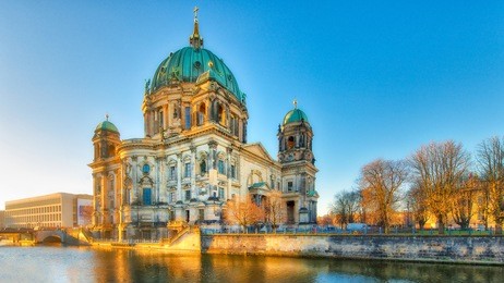 berlin cathedral from the river spree in the early morning