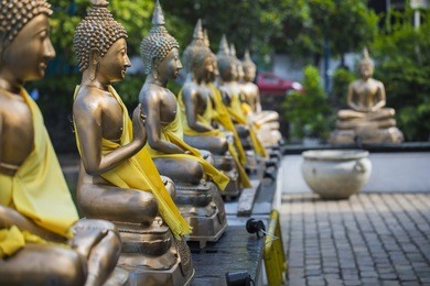 buddha statues in seema malaka temple, colombo, sri lanka