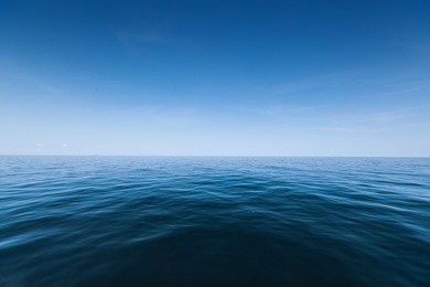 calm sea surface with waves at sunny day