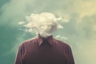 stressed man head in the cloud