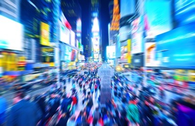 view of times square at night in new york city with motion effect