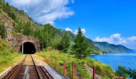 tunnel railway near lake baikal and bridge in foreground. irkutsk region. russia