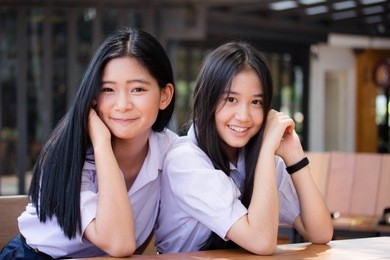 two asia thai high school student uniform best friends beautiful girl reading book
