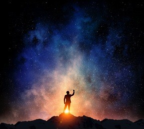 businessman against starry sky . mixed media