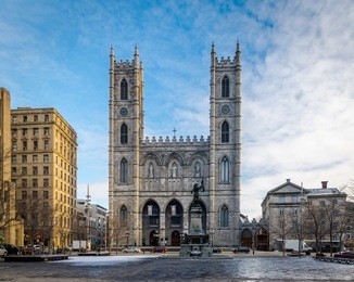 basilica of notre-dame of montreal and place d'armes - montreal, quebec, canada