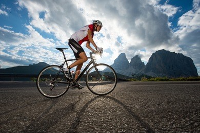 woman by road cycling competition