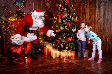 miracles happen. small children saw santa claus on christmas eve. christmas concept.