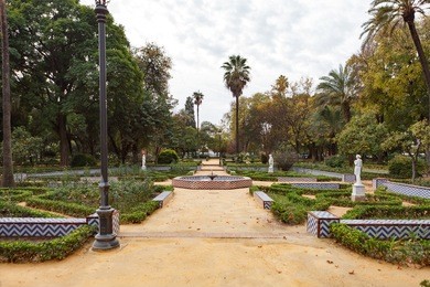 fountain in maria luisa park (parque de maria luisa). seville, andalusia, spain