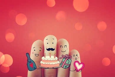 four fingers decorated as four people having fun time. suitable to be used for anything festivals.