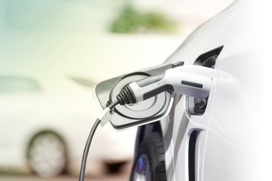 charging an electric car, future of transportation