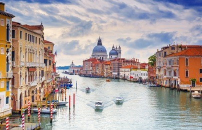 canal grande with basilica santa maria della salute in the background as seen from ponte dell accademia, venice, italy