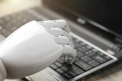 artificial intelligence hand type on keyboard
