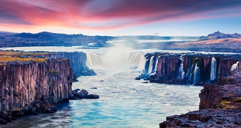 colorful summer landscape on jokulsa a fjollum river. beautiful sunrise scene on the selfoss waterfall in jokulsargljufur national park, iceland, europe. artistic style post processed photo.