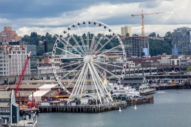 waterfront architecture of seattle featuing the new ferris wheel