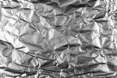 abstract crumpled silver aluminum foil background texture