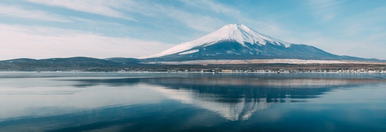 the sacred mountain of fuji in the background of blue sky at japan