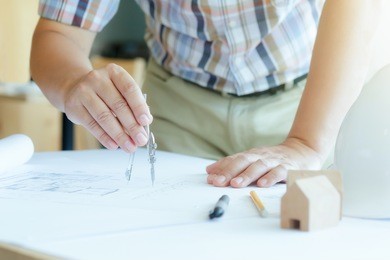 architect or engineer working in office, construction concept. engineering tools.vintage tone retro filter effect,soft focus(selective focus).